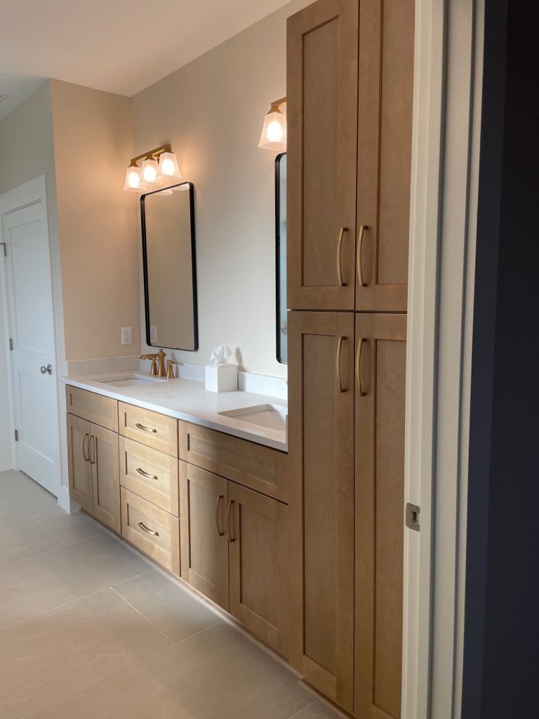 Primary Bath with wood cabinets